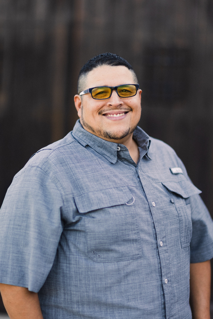 Jose Ponce Jr. in a professional portrait.